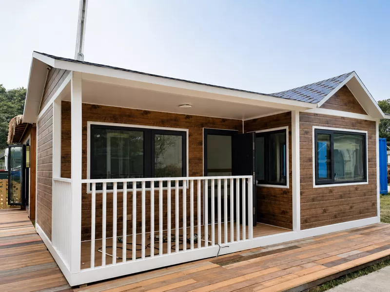 Prefab house exterior with insulated metal siding panels Prefab house exterior with insulated metal siding panels